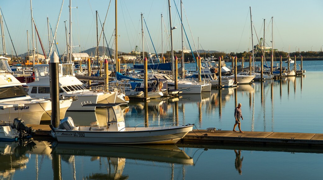 Callemondah which includes a bay or harbor and a sunset as well as an individual male