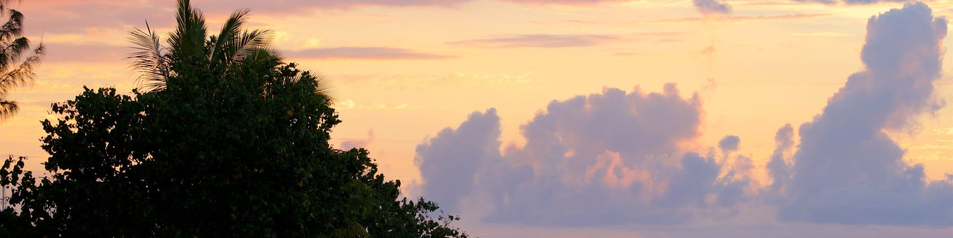 Mahina featuring a sunset and general coastal views