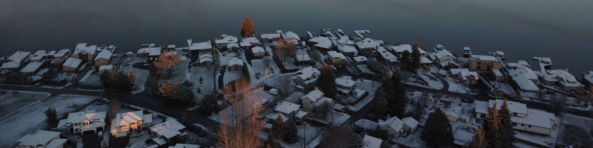 Aerial drone view of the eastside of Lake Stevens at sunset in winter