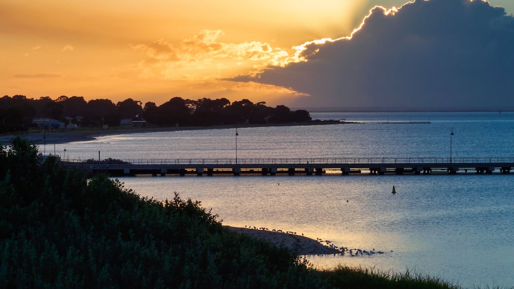 Dramatic sky with the sun behind the clouds - Portarlington, Victoria, Australia