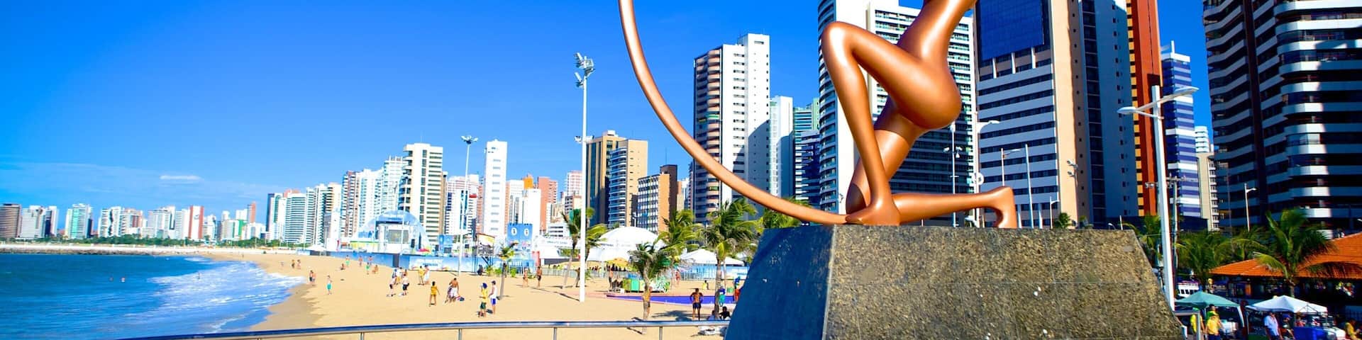 Fortaleza showing a beach, outdoor art and city views