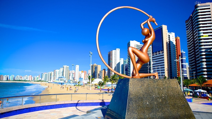 Fortaleza showing a beach, outdoor art and central business district