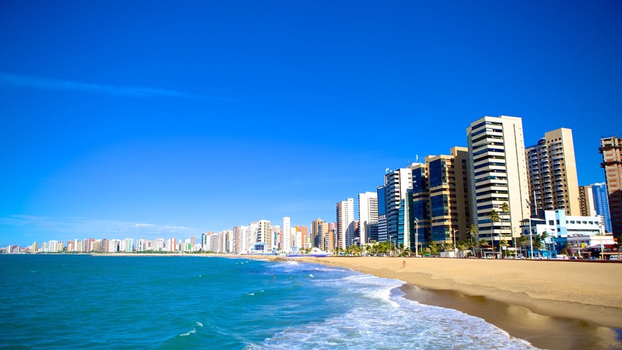 Fortaleza showing a beach, cbd and a high-rise building