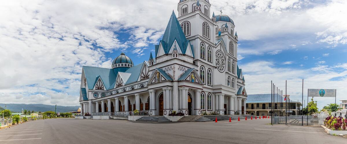 A large, ornate church with multiple domes and spires.