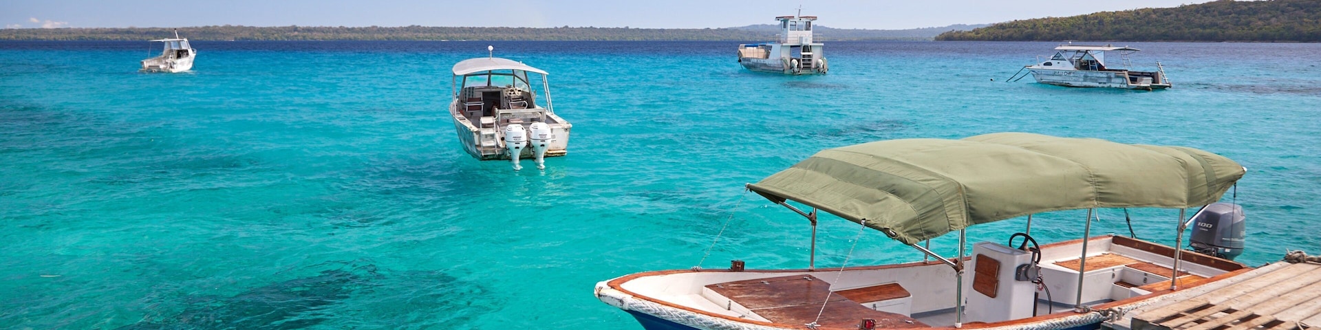 Ilha Bokissa mostrando paisagens litorâneas e cenas tropicais