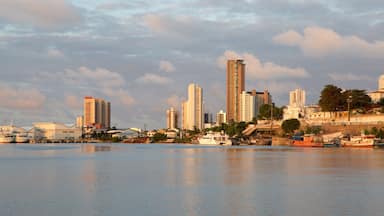 Natal which includes skyline, boating and a bay or harbor