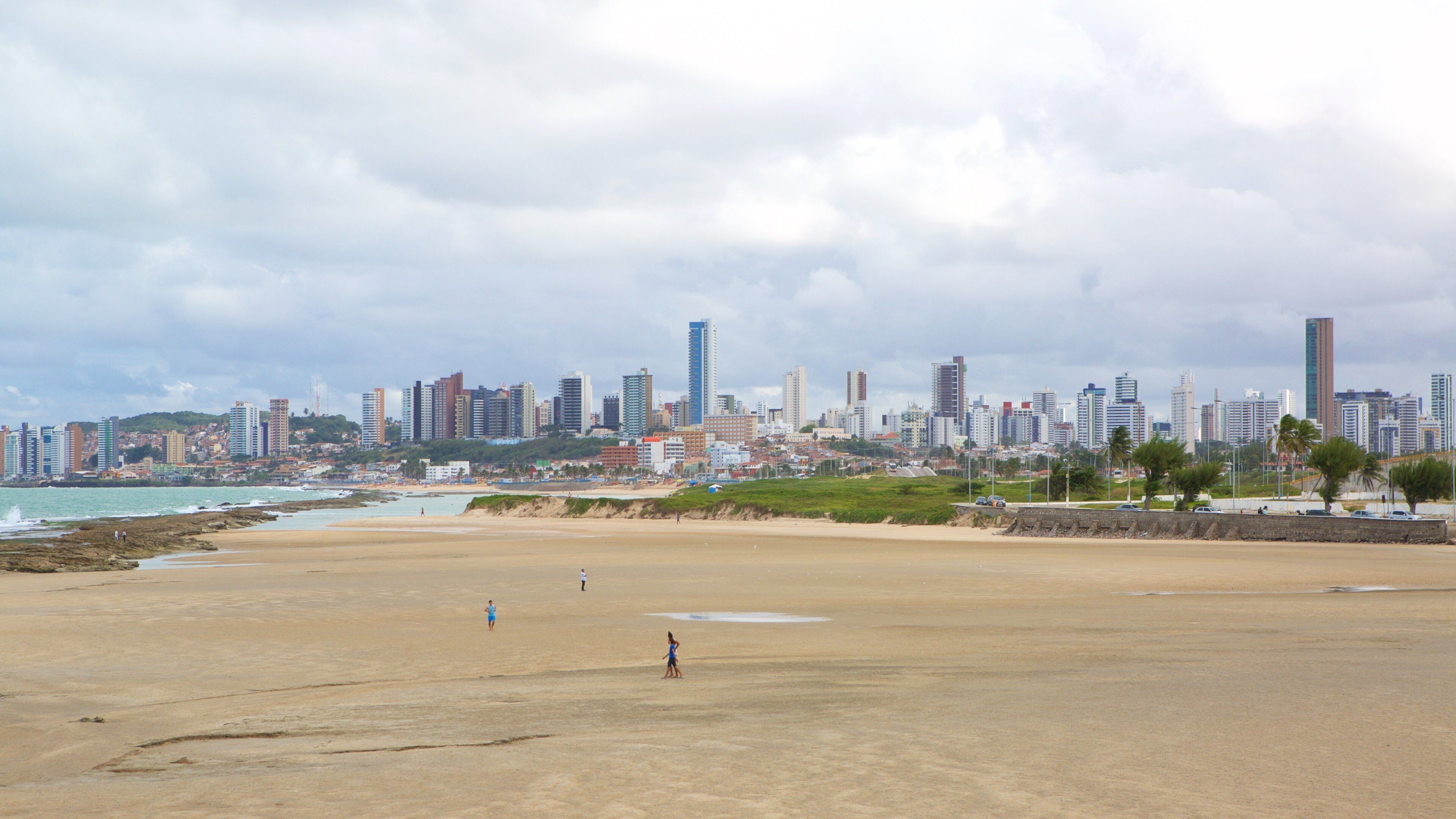 Natal ofreciendo vistas generales de la costa, una playa de arena y horizonte