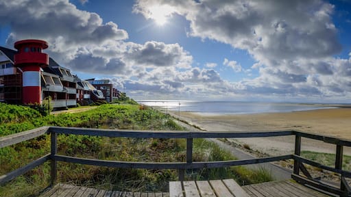 Panorama view of vantage point and promenade along the water's edge around the southernmost tip of the island Amrum in Wittdün, North Frisia, Schleswig-Holstein, Germany.