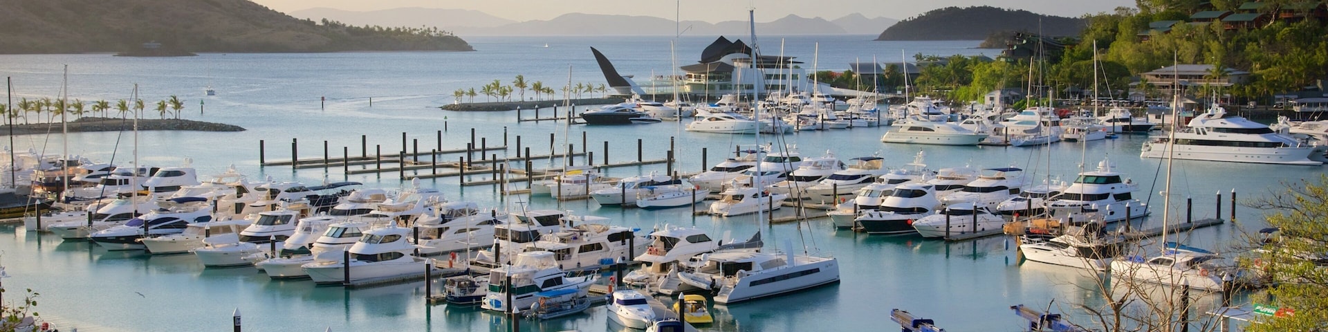 Hamilton Island Marina which includes boating, a bay or harbour and landscape views