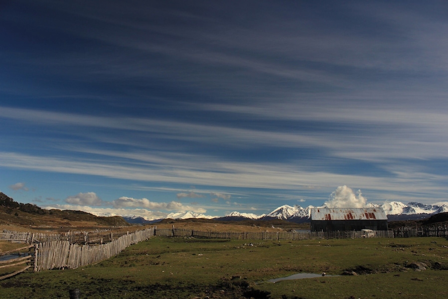 Gorgeous farm house under a gorgeous sky. It's ALWAYS golden hour this far south!