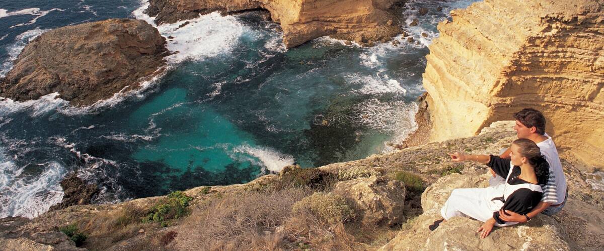 Port Lincoln which includes landscape views and rocky coastline as well as a couple