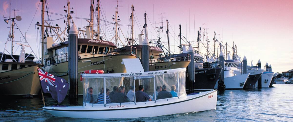 Port Lincoln which includes a marina, a sunset and a bay or harbor