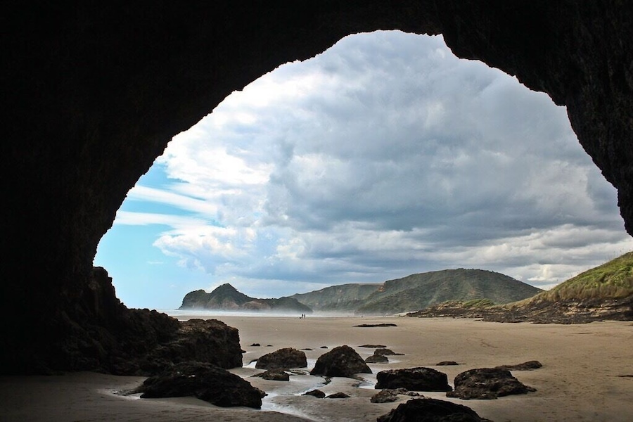 There are some amazing beaches close to Auckland - Bethells Beach being one of them. Check out the black sand (caused by high iron content from volcanic origin) and awesome sea caves! Wouldn't want to get trapped inside as the tide comes in though...