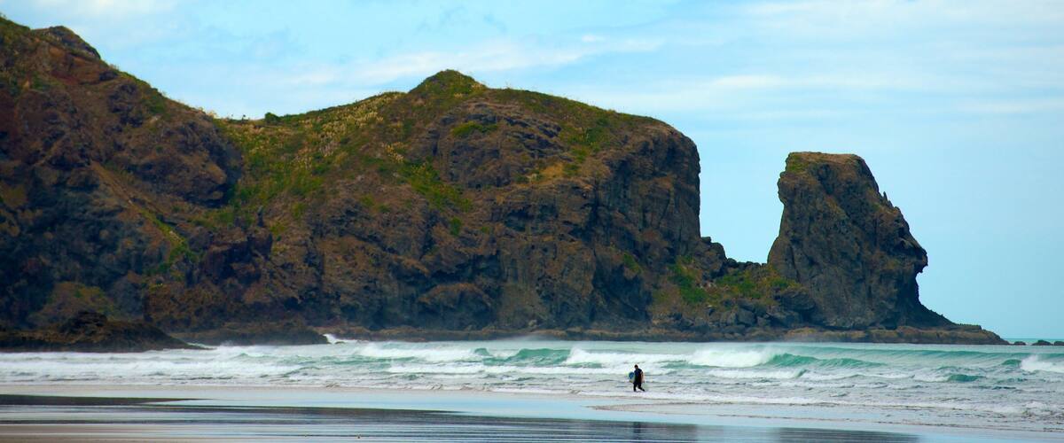 Bethells Beach featuring general coastal views, rocky coastline and a beach