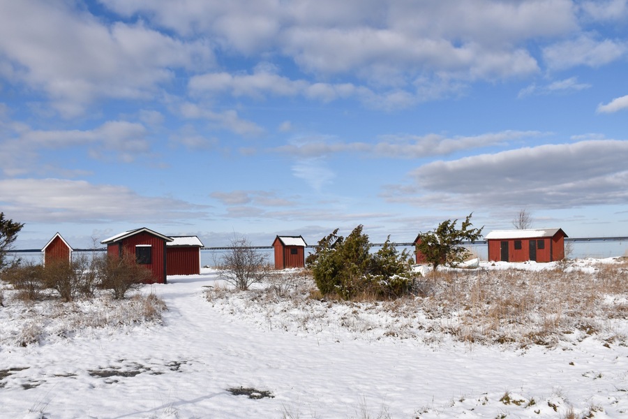 Old fishing cabins in winter season by Farjestaden at the swedish island Oland; Shutterstock ID 1327961756; Purchase Order: -