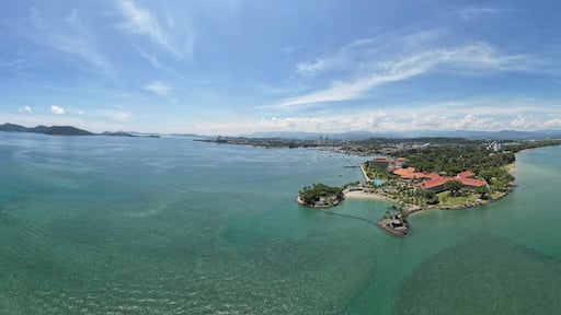 Kota Kinabalu, Sabah Malaysia – June 15, 2022: The Tanjung Aru Beach, Fisherman Village and Shangri-La Hotel