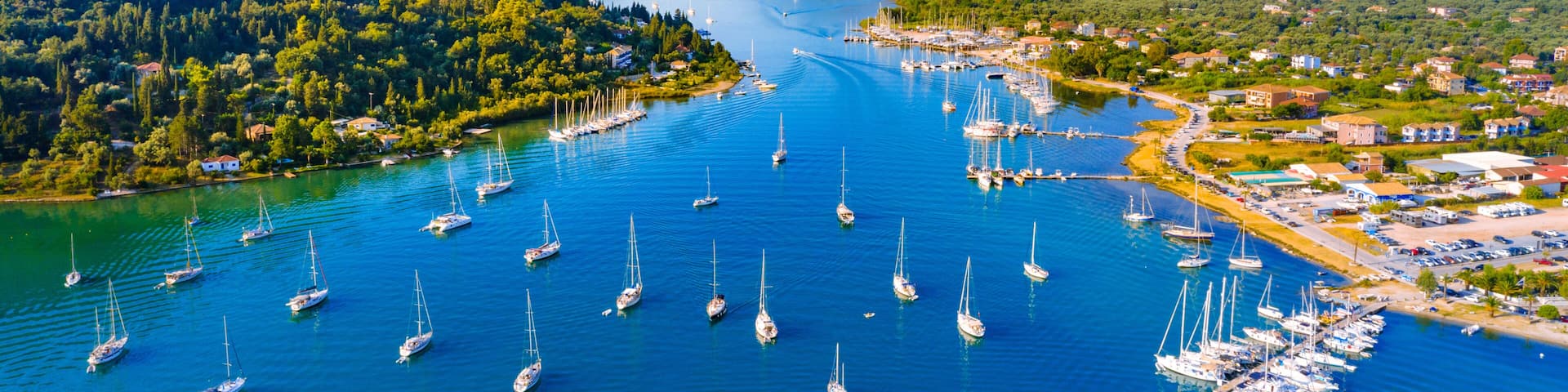 Aerial drone bird's eye view photo of iconic port of Nidri or Nydri, Leflkada island, Ionian, Greece
