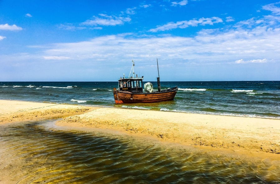 Fishing boat on the beach.
#AquaTrove