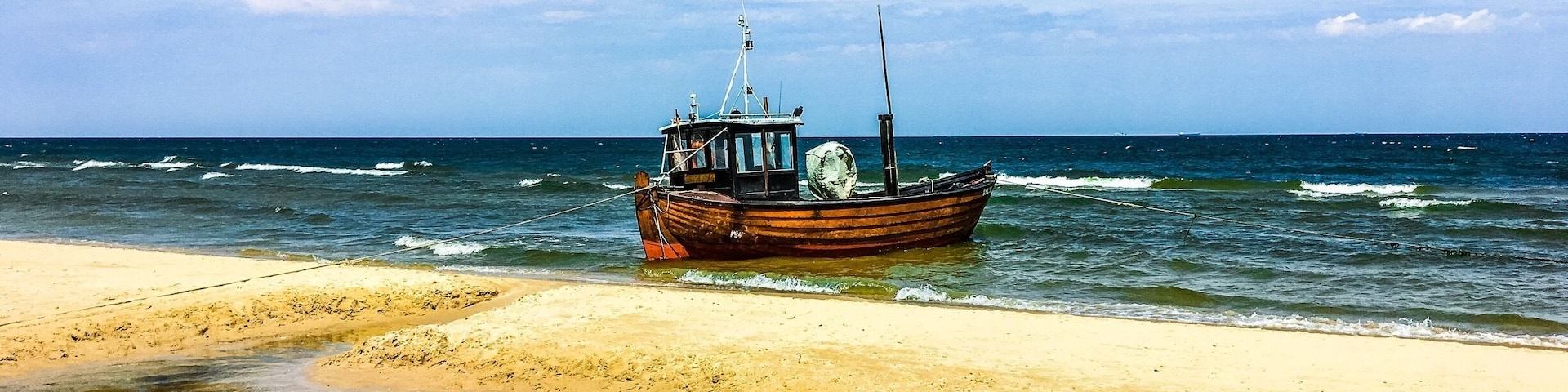 Fishing boat on the beach.
#AquaTrove