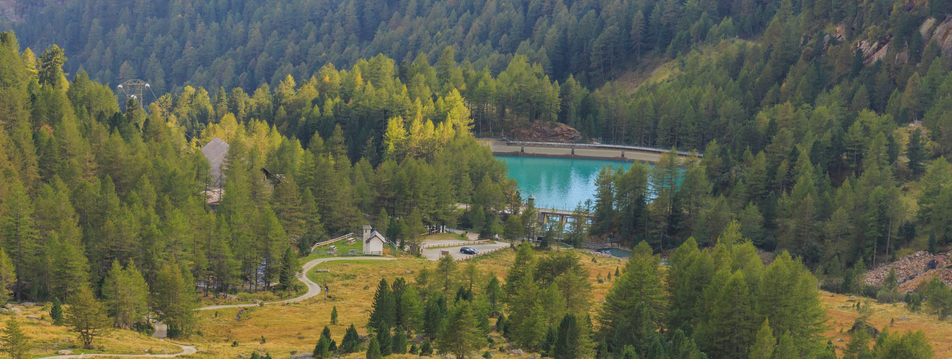 Mountain hiking of parking in power station Malga Mare to Lago Lungo (2553m).