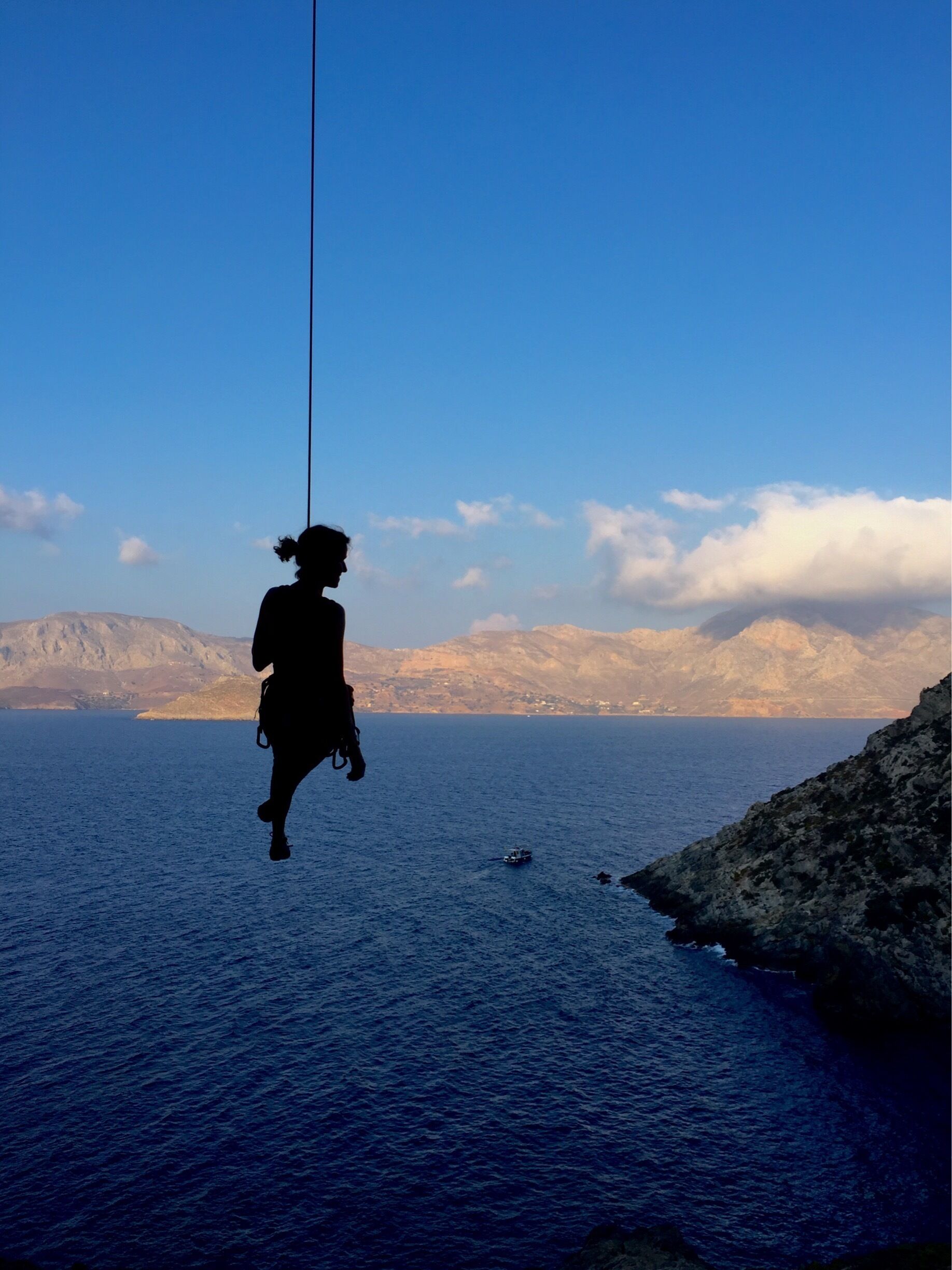 Descending from a sport climbing cave route in the Irox Sector on Telendos, a smaller, quieter island off Kalymnos, Greece. Quiet, no cars. Many smaller secluded beaches and hiking opportunities. Fly to Kos from many European cities, then ferry to Kalymnos, taxi across the island, and then ferry to Telendos, from Kos, less than 30€ pp when sharing a cab.