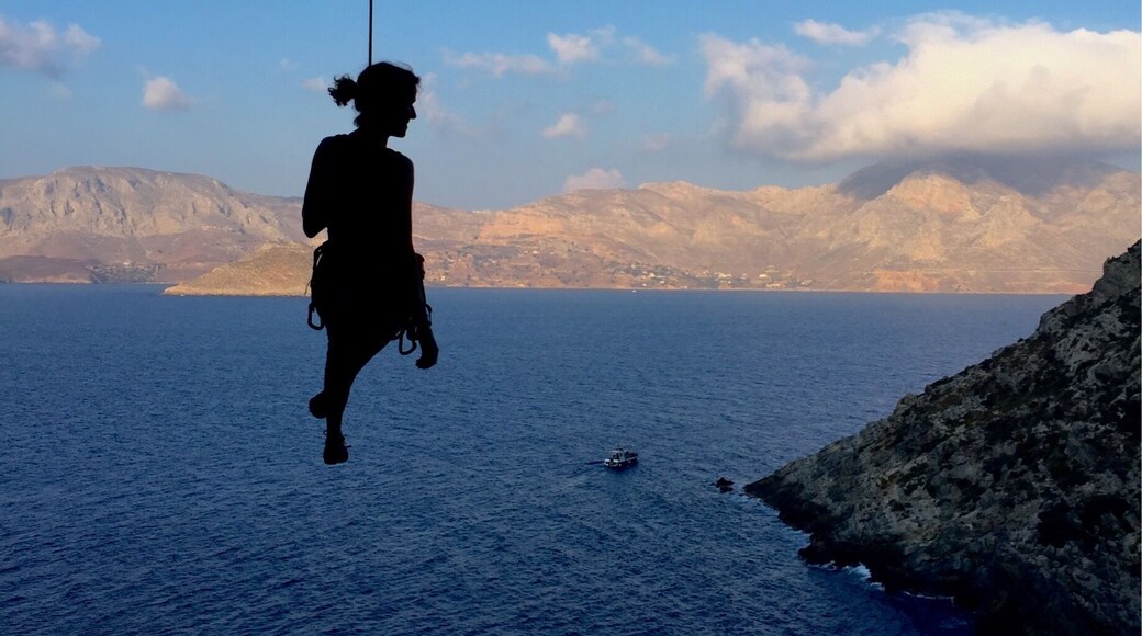 Descending from a sport climbing cave route in the Irox Sector on Telendos, a smaller, quieter island off Kalymnos, Greece. Quiet, no cars. Many smaller secluded beaches and hiking opportunities. Fly to Kos from many European cities, then ferry to Kalymnos, taxi across the island, and then ferry to Telendos, from Kos, less than 30€ pp when sharing a cab.
