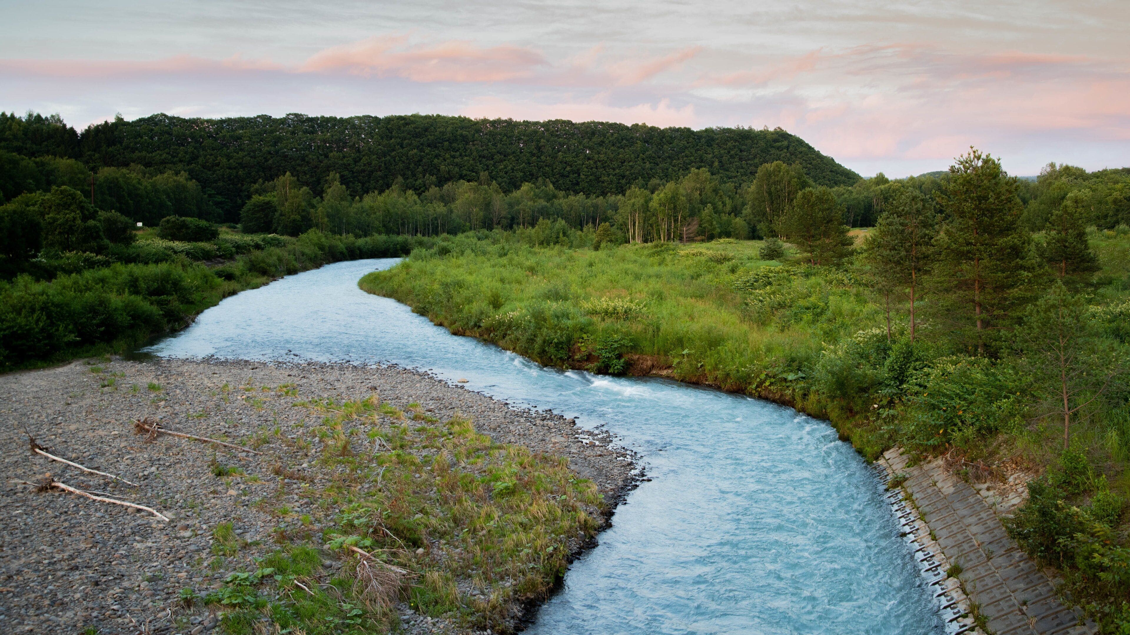 Asahikawa showing a river or creek, a sunset and landscape views