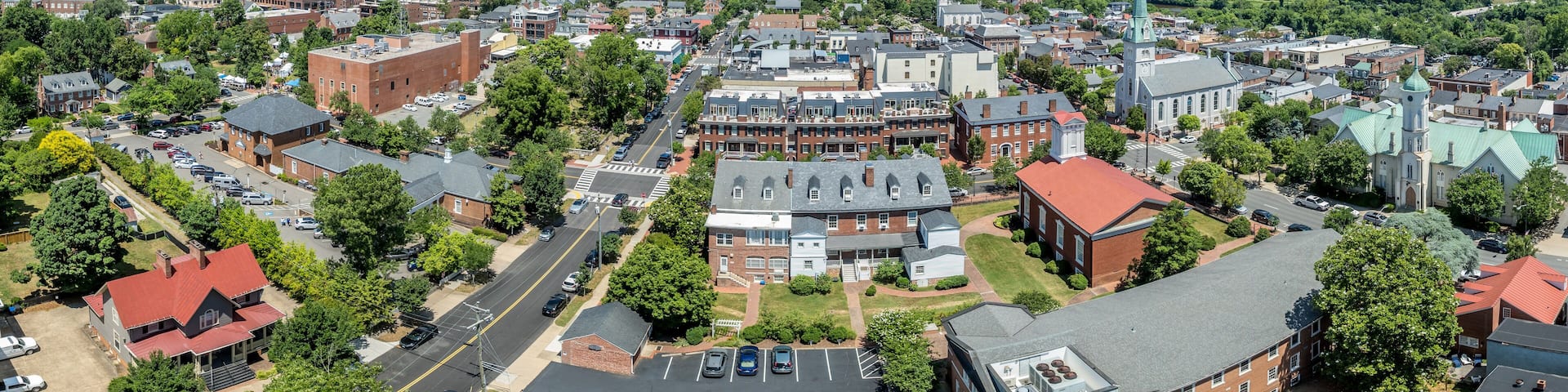 Aerial view Fredericksburg Virginia with Circuit Court building , historic business district, Baptist church, Chatham bridge over Rappahannock River