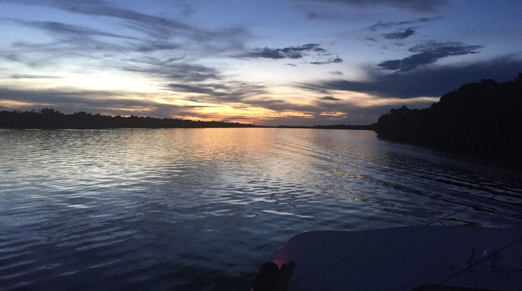 Sunset after departing parrot cove on the Amazon River