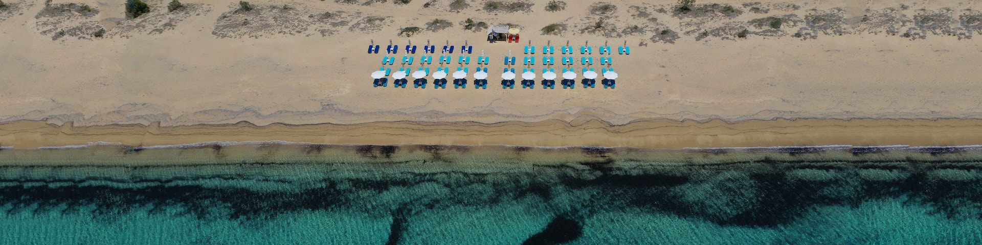 Aerial drone photo of beautiful and popular beach of Agia Anna in Naxos island, Cyclades, Greece