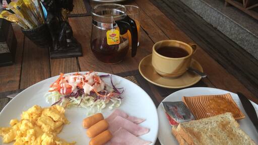 Stopped at a resort for the night. Complementary American breakfast I prefer local food . Egg and rice would have tasted better.