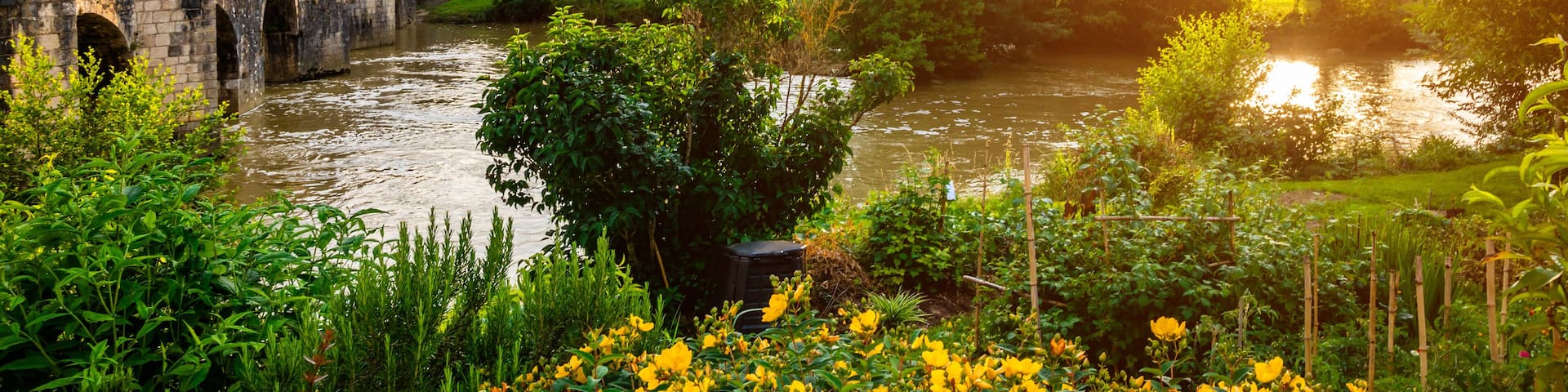 Medieval bridge and Barbaste village on background