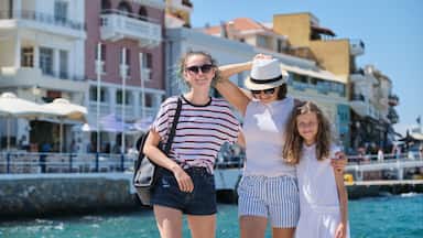 Mother with children Mediterranean summer sea holidays.