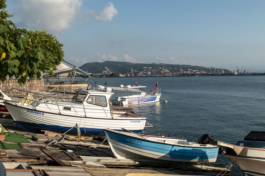 Zonguldak eregli district, fishing boats and erdemir iron and steel factory behind