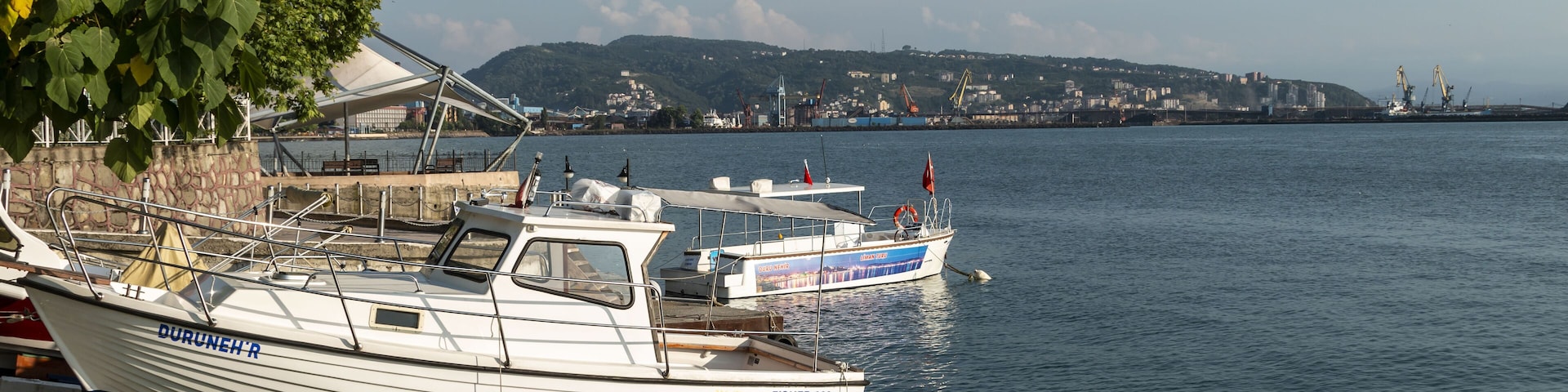 Zonguldak eregli district, fishing boats and erdemir iron and steel factory behind