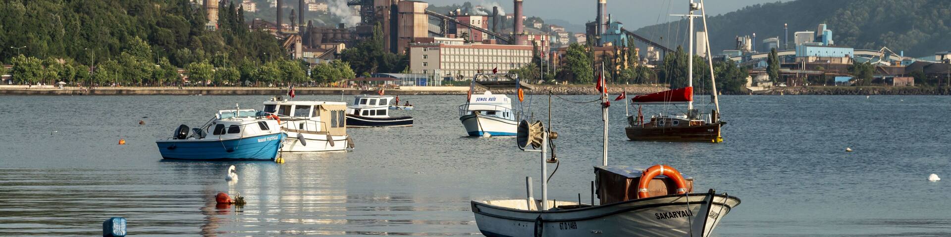 Zonguldak eregli district, fishing boats and erdemir iron and steel factory behind