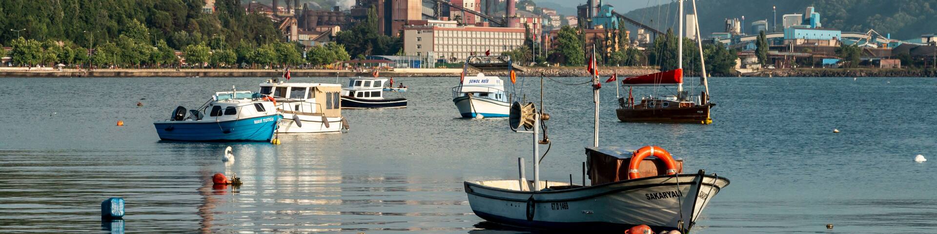Zonguldak eregli district, fishing boats and erdemir iron and steel factory behind