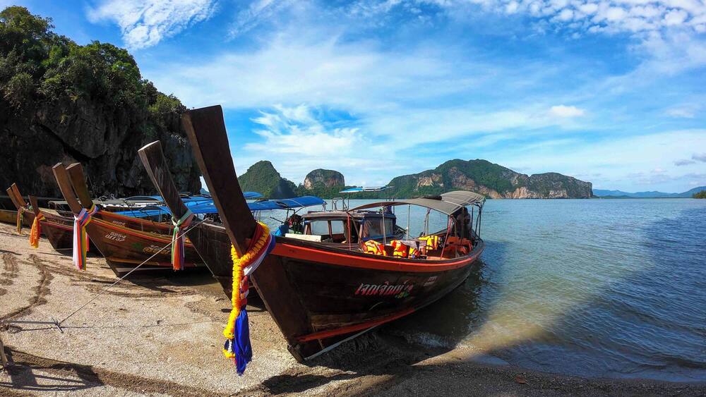 Long-tail Boats anchored in Khao Phing Kan which is an island in Thailand located in Phang Nga Bay northeast of #Phuket. Did you know that since 1974, when this island was featured in the James Bond movie The Man with the Golden Gun, Khao Phing Kan and Ko Ta Pu have been popularly called James Bond Island.