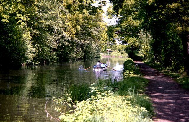 Basingstoke Canal: Junction with River Wey Looking eastwards, the sign boards at the junction can just be discerned.