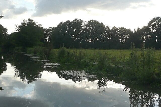 River Wey Navigation near West Hall This section of the navigation has a more river-like quality, with open fields to the west.