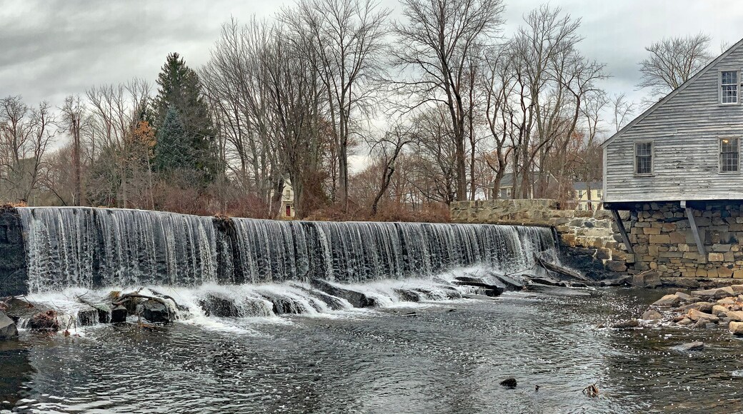 Historic old house with waterfall in Groton, Massachusetts near Boston