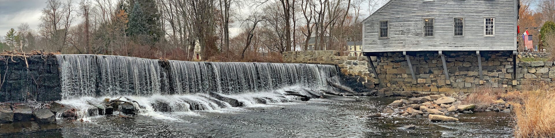 Historic old house with waterfall in Groton, Massachusetts near Boston