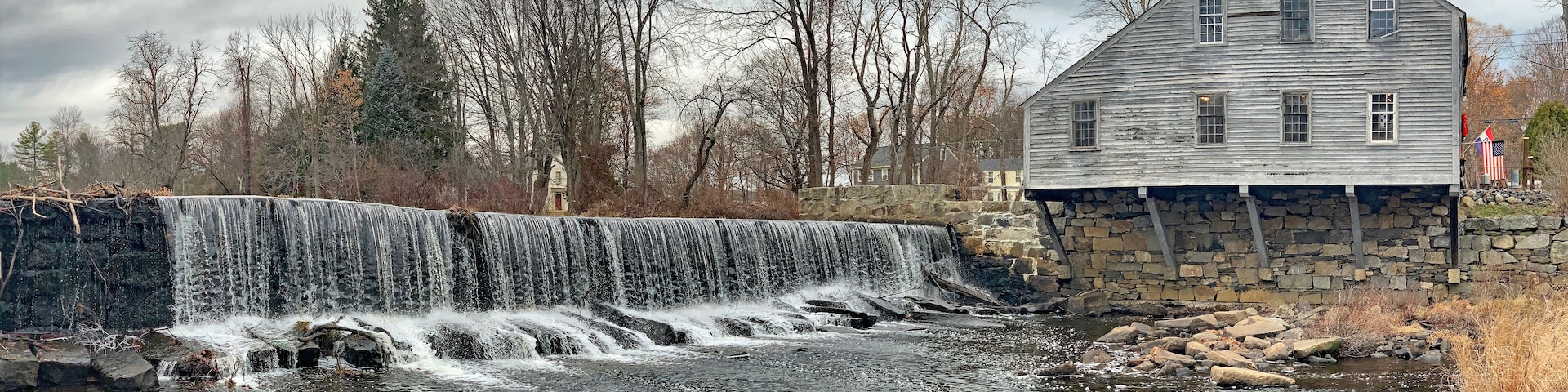 Historic old house with waterfall in Groton, Massachusetts near Boston