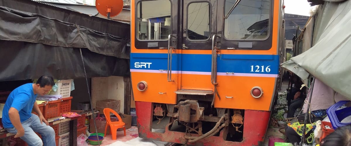 Train crossing the market