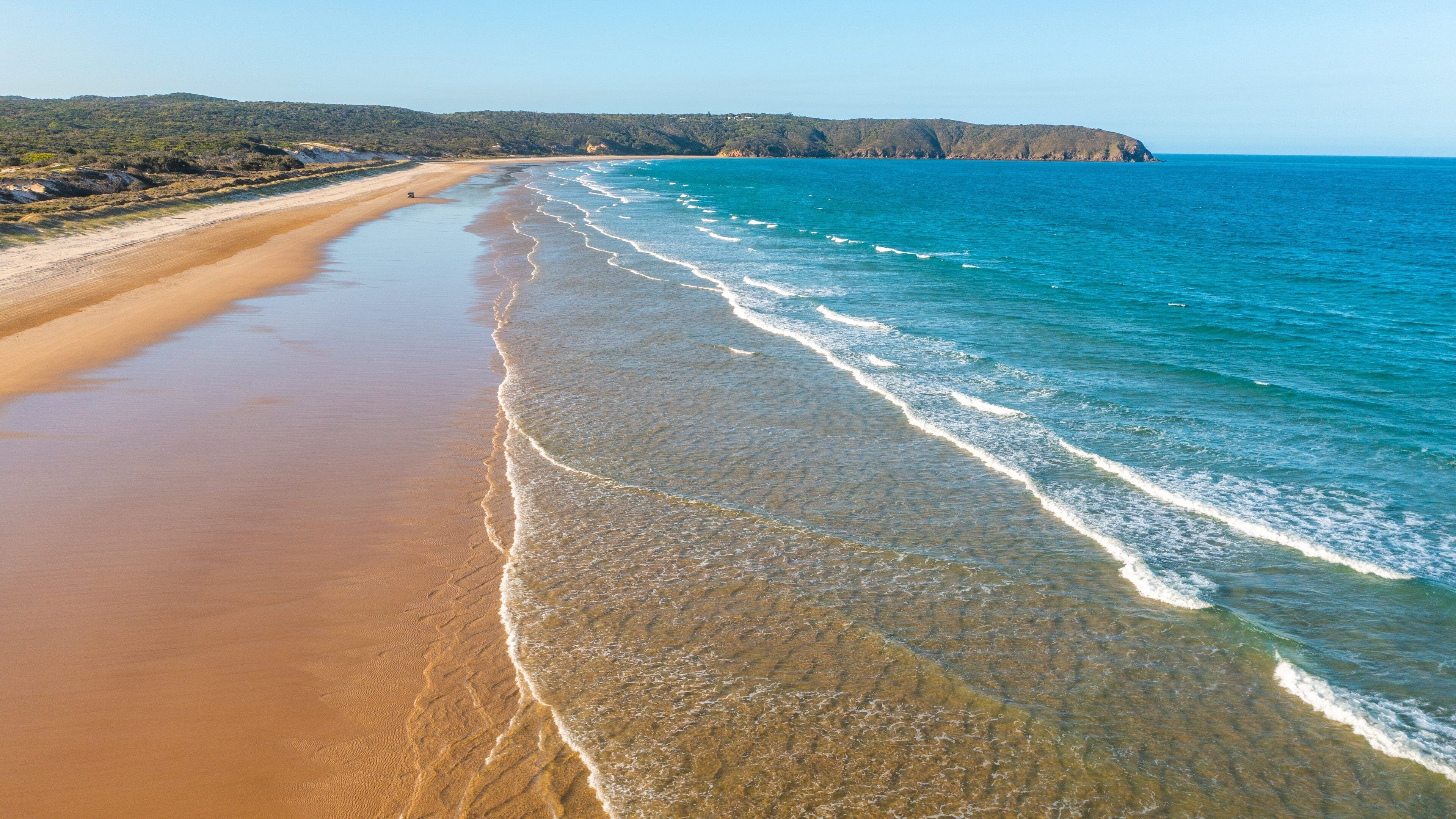 Byfield which includes a beach, landscape views and general coastal views