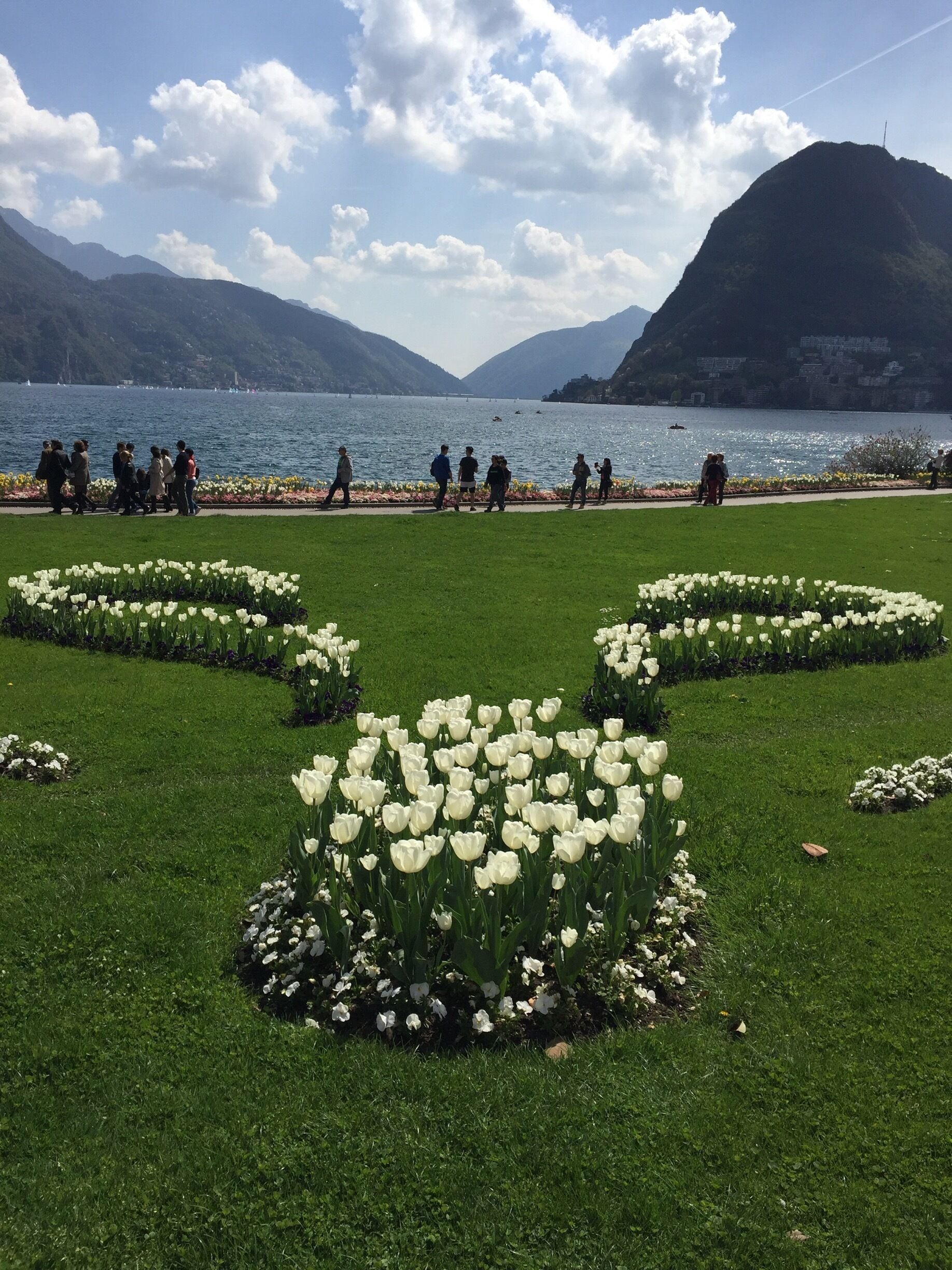 Gardens, lake and mountains make Lugano a lovely place to visit.