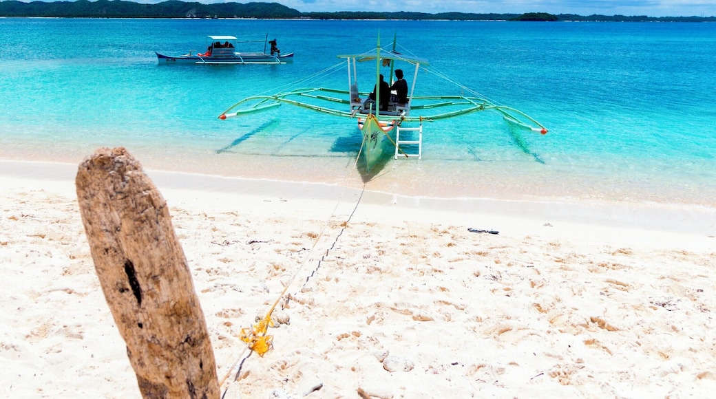 There is a perfect place for a day trip in Siargao. Just talk to any boat owner and ask him to take you to Naked Island. #LifeAtExpedia