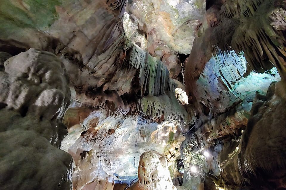 A cave with stalactites and stalagmites.