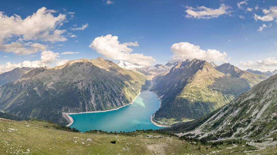 Aerial panoramic shot of Schlegeisspeicher glacier reservoir in zillertal alps in Austria