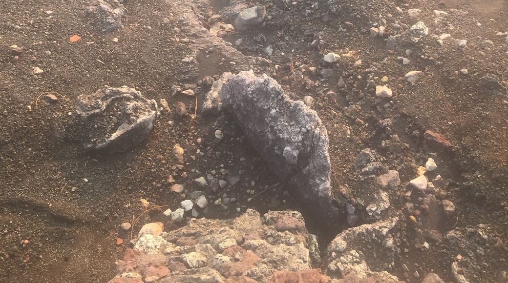 Active volcano in Nicaragua. Boiling lava at bottom and smoke rising off of it.